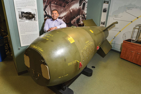 Captain Antonio Gallop poses with model warhead