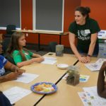 Carolyn Fisher and students