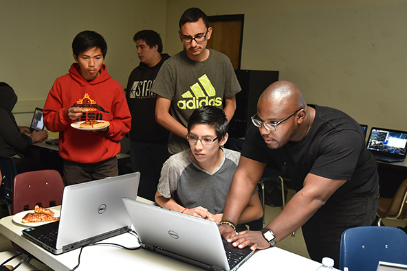 Cedric Carter shares his passion for cyber research with EVHS students.