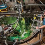 researcher looks over Annular Core Research Reactor