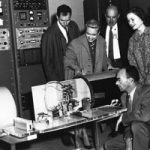 visitors inspect telemetry display at 1959 event