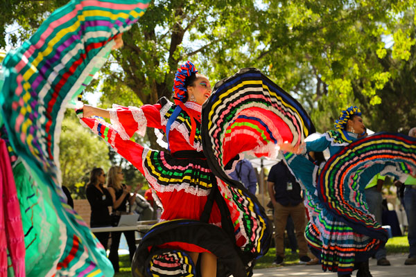 dancers in colorful costumes