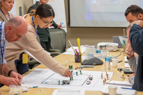 students participate in a table-top exercise