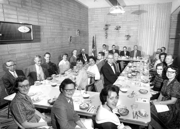 group of reporters at luncheon