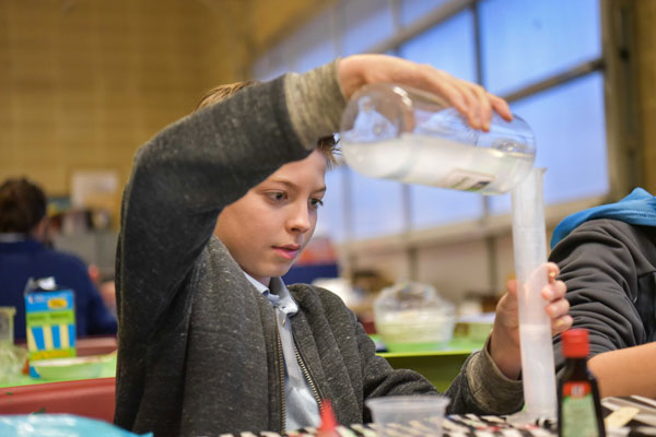 student works on chemistry experiment