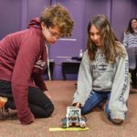 students test robot vehicle