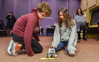 students test robot vehicle