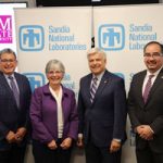 Sandia and NMSU execs at signing event