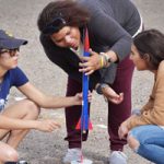 intern and students set up a rocket