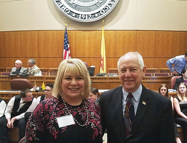 Jackie Kerby Moore poses with state Sen. Jim White