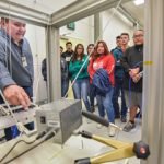 scientist demonstrates equipment use for students