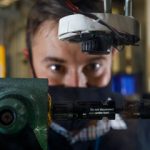 Close-up of researcher working on arc-fault generator