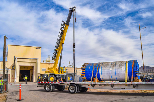 giant steel canister on flatbed