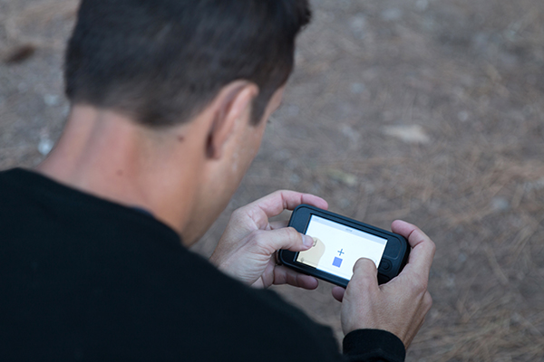 TESTING THE LIMITS — A hiker completes a fast-paced electronic cognitive test following the completion of the rim-to-rim hike. (Photo by Michael Padilla)