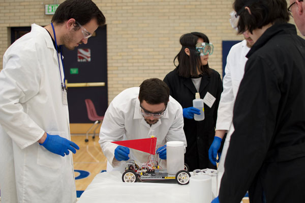 team members work on chem-e-car