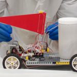 team members work on chem-e-car