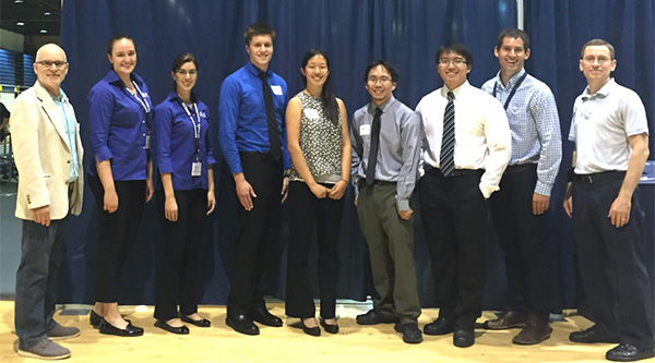 Sandians with the winners of the Sandia Design Award at the Engineering Design Showcase at UC Davis. Left to right: Jim Schaaf (UC Davis), Jordan Thayer (8238), Helen Smith (8248), Brent Weyers (CoagVISTA), Victoria Chiu (CoagVISTA), Jeffrey-Annguye Le (CoagVISTA), Kevin Leung (CoagVISTA), Jacob Kilbane (8222), Anthony Passerini (UC Davis). (Photo provided by Chris Moen)