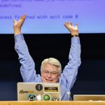 Robert C. Martin enthusiastically talks to a rapt audience