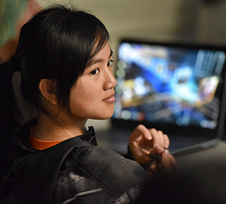 THIRTY STUDENTS ATTENDED the full-day cyber workshop presented by Tony Lona and a team of Sandia cybersecurity researchers. The student pictured here listens during a session on cyber forensics.