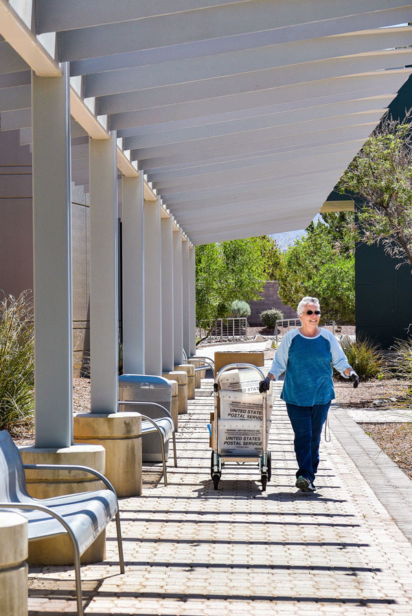 woman with mail cart