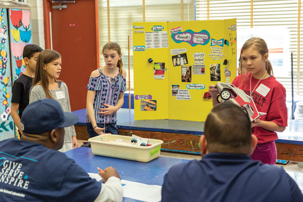 students give presentation to judges