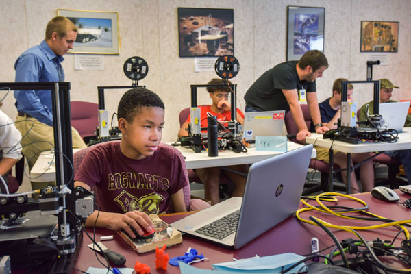 teens working on computers