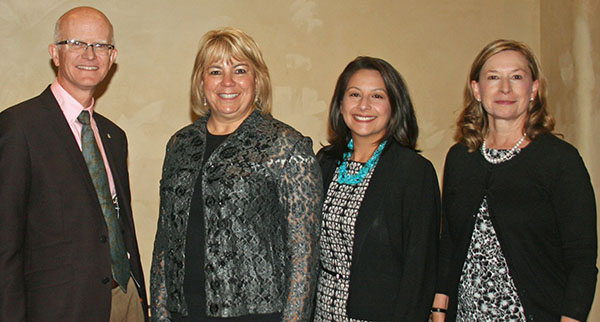 TECH TRANSFER GATHERING — From left, Andy McIlroy, deputy chief technology officer and director of Research and Partnerships Center 1900; Jackie Kerby Moore, manager of Technology and Economic Development Dept. 1933; Jetta Wong, director of the DOE Office of Technology Transitions; and Mary Monson, senior manager of Industry Partnerships Dept. 1930 joined technology transfer experts from 22 federal labs at the Federal Laboratory Consortium Mid-Continent and Far West Regional Meeting in Albuquerque. (Photo by Linda von Boetticher)