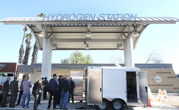 A Hydrogen Station Equipment Performance, or HyStEP, device, at right, prepares for testing at a California State University, Los Angeles, hydrogen station. (Photo by Dennis Schroeder/National Renewable Energy Laboratory)