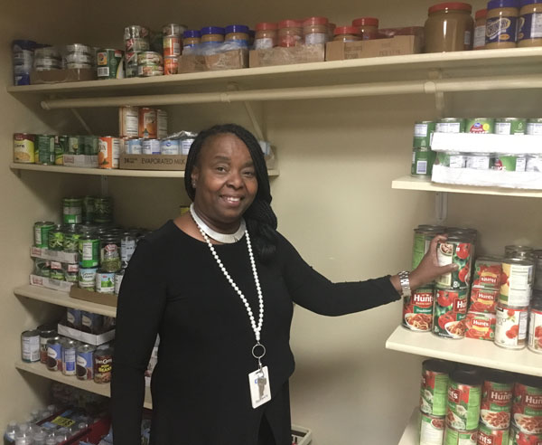 Bev McMillan checks the snack pantry