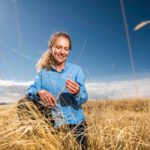 Jennifer Payne in a field of native vegitation