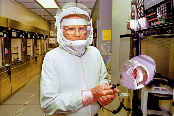 Willis Whitfield in hazmat suit in lab