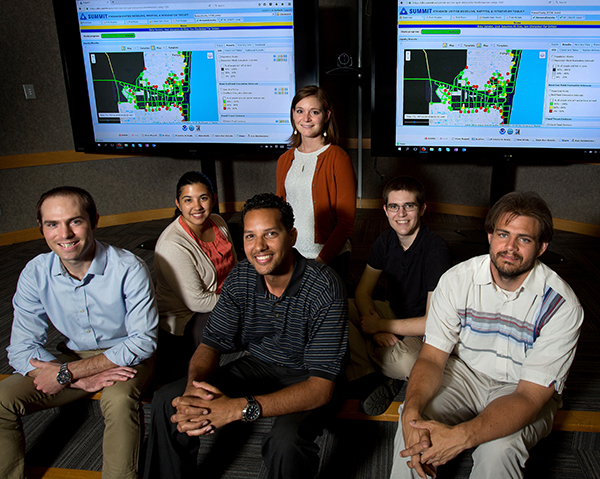 HURRICANE TEAM – (from left to right): Brandon Heimer (8112), Patricia Pacheco (8114), Nerayo Teclemariam (8112), Lynne Burks (8116), Josh Bauer (8954), and Aaron Gibson (8954). (Photo by Dino Vournas)
