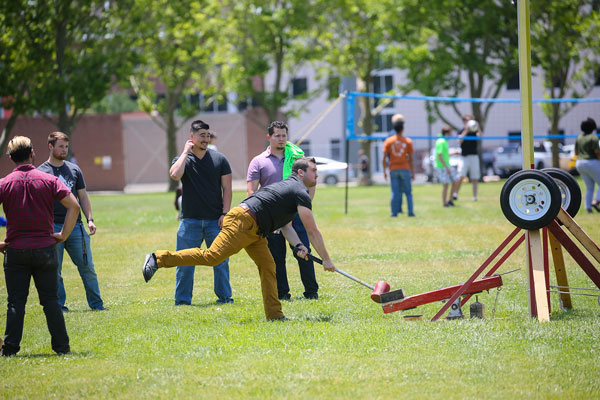 students compete in hammer game