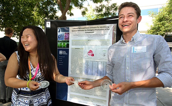 Sarah Deng (8633 and Frank Charbonier (8621) share a light moment.