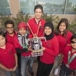 Sandian Mohamed Ebeida and a team of kids he coached from Albuquerque's Islamic Center of New Mexico. The team won the Inspiration Core Value award at a recent international First Lego League tournament in West Virginia. (Photo by Randy Montoya)