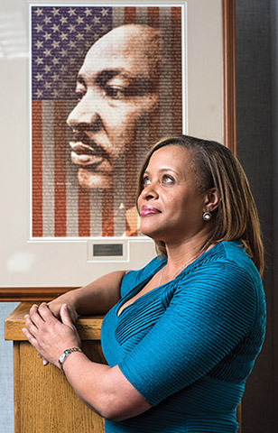 HR AND COMMUNICATIONS DIV. 3000 VP Melonie Parker keeps a portrait of the Rev. Martin Luther King Jr. in her office as a source of inspiration and motivation. Melonie’s parents marched with Dr. King in the 1960s in Greensboro, North Carolina. (Photo by Randy Montoya)