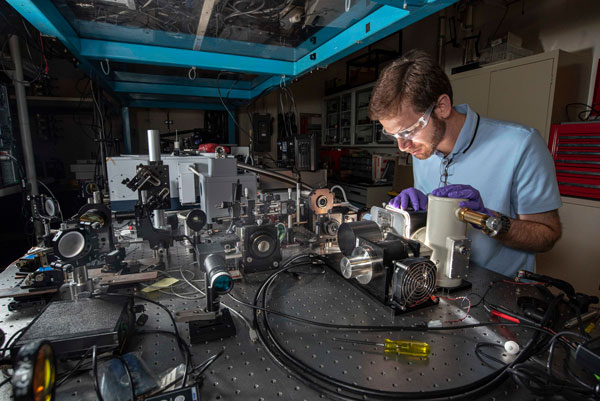 Optical engineer Michael Goldflam in lab