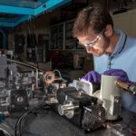 Optical engineer Michael Goldflam in lab