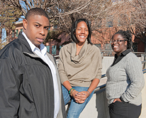 LIVING LEGACY— Sandians, left to right, Melvin Bennett (10626), Patrice Gregory (0422), and Lydia Coleman (10694) recall the impact Dr. Martin Luther King Jr. had on their lives and the lives of their families. (Photo by Randy Montoya)