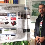 WINNING POSTER — Aashish Priye shows his winning poster in the annual Postdoctoral Technical Showcase at Sandia California. The showcase is held each December at Sandia’s campuses in New Mexico and California to display the breadth of research by postdoctoral employees. (Photo by Jasmine King-Bush)