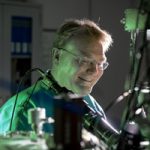 Ed Bielejec examines a material at the Ion Beam Laboratory