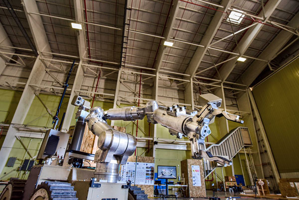 A robot maneuvers through obstacles