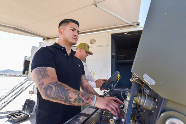 Staff Sgt. Michael Marquez worths through one of the bomb squad scenarios