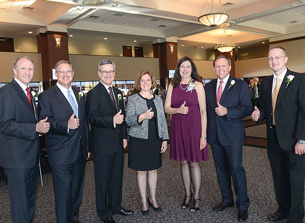 AWARD WINNERS — Steve Rottler, third from left, and other award recipients join Dwight Look College of Engineering Dean M. Katherine Banks, center, during recent ceremonies at Texas A&M. Honorees, from left, are Stuart R. Bell, president, the University of Alabama; Greg Garland, chairman and CEO, Phillips 66; Steve Rottler; M. Katherine Banks; Merri J. Sanchez, chief scientist, Air Force Space Command; Charlie Shaver, chairman of the board and chief executive officer, Axalta Coating Systems; and Christopher T. Rodenbeck, head, advanced concepts group, US Naval Research Laboratory, who was presenteds the 2016 Outstanding Early Professional Achievement Alumni Award.