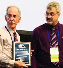 SANDIA RETIREE Ken Gillen (left) received the ACS best paper award for a review of rubber aging, co-authored by Ken and researchers Mat Celina and Robert Bernstein.