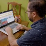 man working from home on laptop