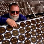 In a 1994 file photo, Jack Cannon inspects photovoltaic cells