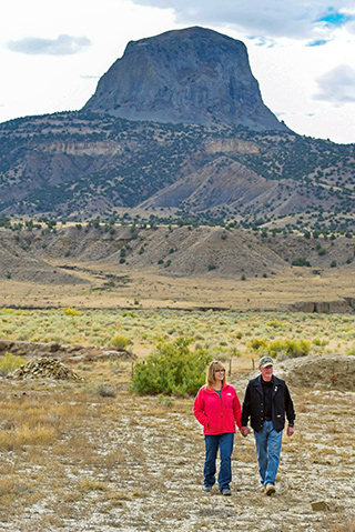 Mike Tachias and wife Rowena look over plans for the Cabezon Wounded Warrior Haven