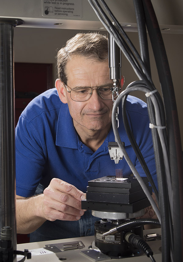 SANDIA RESEARCHER Paul Vianco works on thin films, nanometer-thick layers of metal that can be defined into precision electrical circuits. He won the Surface Mount Technology Association's 2015 Best of Proceedings award and will be honored with other winners at the association's meeting in September. (Photo by Randy Montoya)