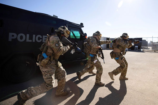 Berkeley police approach the hostage area.